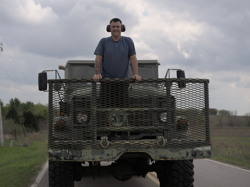 Donnie on a military truck