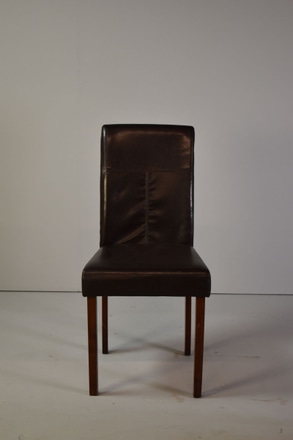 main photo of Dining Chair Upholstered in Brown Leatherette