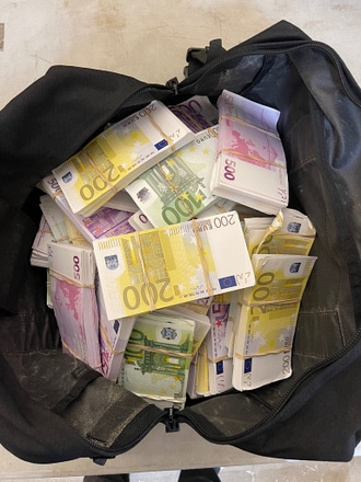 main photo of Black Duffle Full of Euros