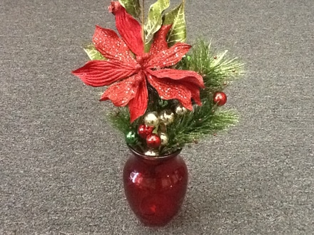 main photo of Holiday Floral Arrangement 6" Red Vase