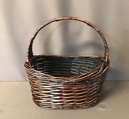 main photo of Brown Oval Basket with Handle