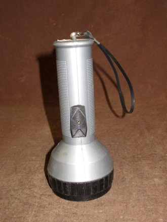 main photo of flashlight plastic silver black