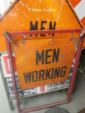 main photo of sign street men working 4 on stand