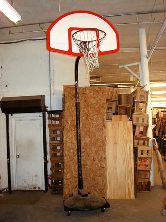 main photo of basketball set up fiberglass backboard metal base