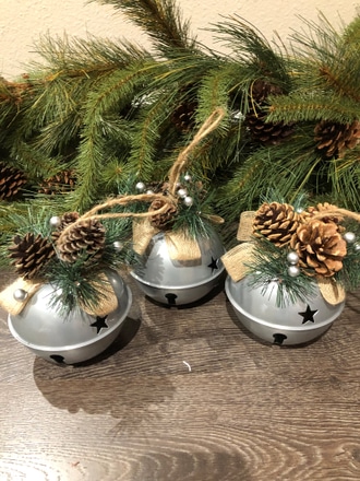 main photo of 6" silver bells with burlap bows & pine cones