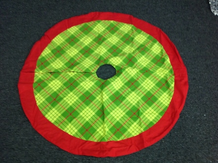 main photo of Lime green plaid with red trim tree skirt