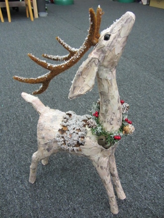 main photo of Reindeer w wreath around its neck, 21" H