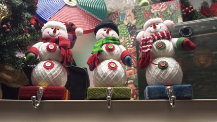 main photo of Colorful snowman stocking hangers