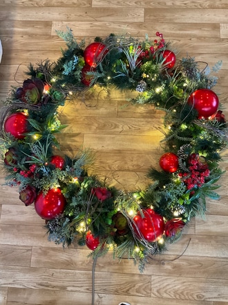 main photo of Succulent wreath with red balls 44”
