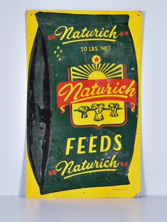main photo of Metal Naturich Feeds Sign