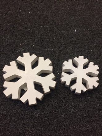 main photo of 5" and 7" wooden snowflakes
