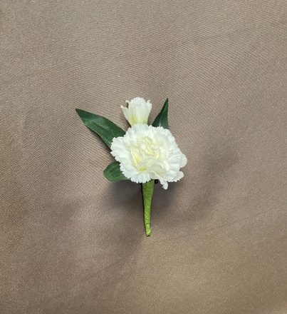 Cream Mini Carnation Boutonnière main photo of Cream Mini Carnation Boutonnière