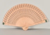 Wooden hand fan with green tabs