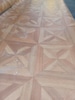Light Wood Pinwheel Pattern Linoleum 9'10" x 14'2"