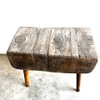 Dark rustic wood stump table