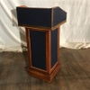 Blue Fabric and Wooden Podium on wheels