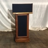 Blue Fabric and Wooden Podium on wheels