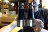 Vintage Binoculars with black leather wrapped around metal
