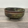 Metal footed planter