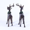 Dark Brown Reindeer Adorned With Green Wreath