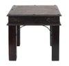 Side table:  rustic dark wood table with heraldic hardware