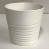 Small white ribbed ceramic pot