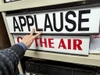 Applause sign - white background, black lettering