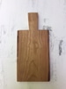cherry bread board with handle and live edge oiled