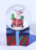 Santa on a Gift Box Mini Snow Globe