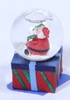 Santa on a Gift Box Mini Snow Globe