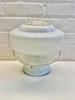 Clear and milk glass globe