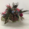 Pink anthurium and feathers