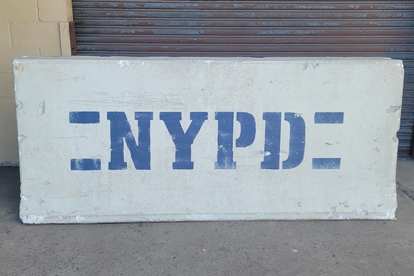 main photo of 8' Faux "Concrete" Traffic Barrier - NYPD on one side