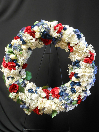 main photo of Red, white & blue easel wreath of roses, hydrangea and iris etc.