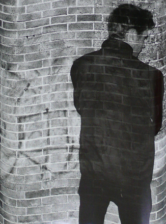 main photo of Unframed Cleared Poster; Man at Brick Wall