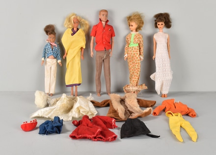 main photo of 5 Assorted Barbies and 15 pcs of Clothing