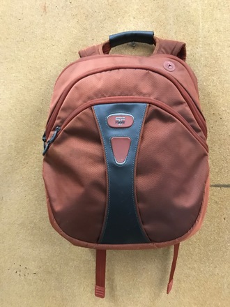 main photo of Rust colored backpack