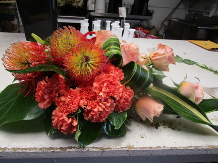 main photo of Fresh Floral Oblong Centerpiece of Tropicals