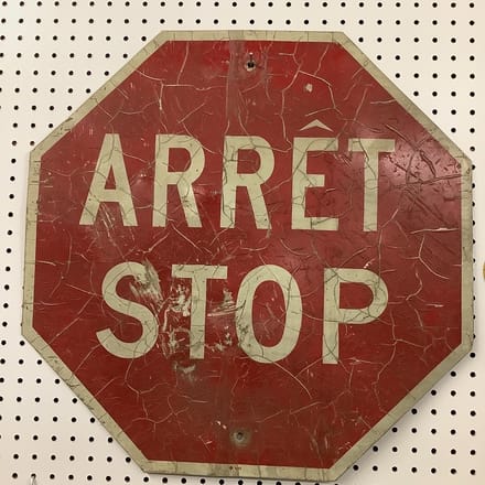 main photo of French and English Stop Sign