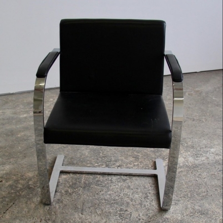 main photo of Sleek Black and Chrome Arm Chair