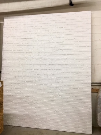 main photo of White Brick Wall