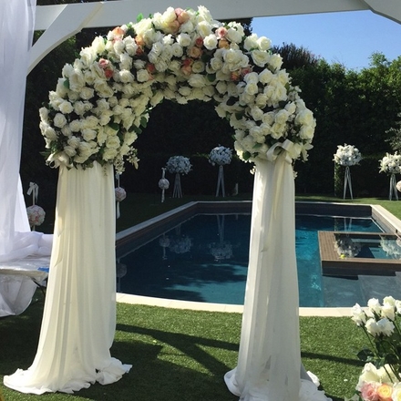 main photo of White Floral Arch with Fabric