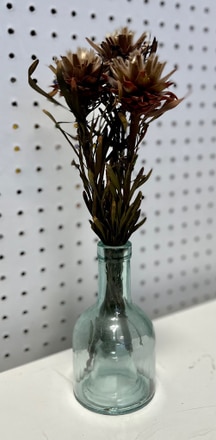 main photo of glass vase with dried flowers