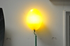 Lamp, wall mount Yellow lemon shaped with green cord.