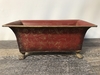 Red and Gold Metal Footed Container