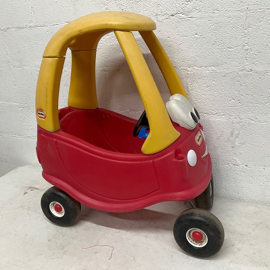 Red and Yellow Plastic Kiddie Car For Rent in East Point Central Atlanta Props and Sets