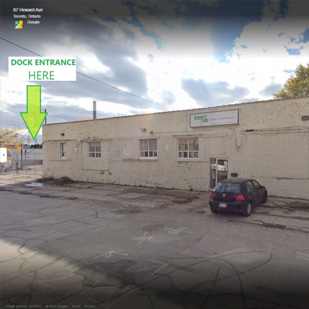 pic of front of Mojo Props with arrow pointing to loading dock location