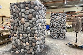 Scenic faux rock pillars for Tractor Vision